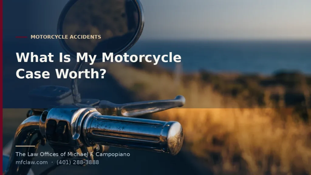 Chrome motorcycle handlebar with a blurred coastal road behind at golden hour